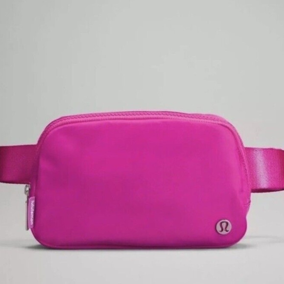 lululemon athletica Handbags - NWT Lululemon SONIC PINK Logo Everywhere 1L Belt Bag Fanny Hip Pack Crossbody